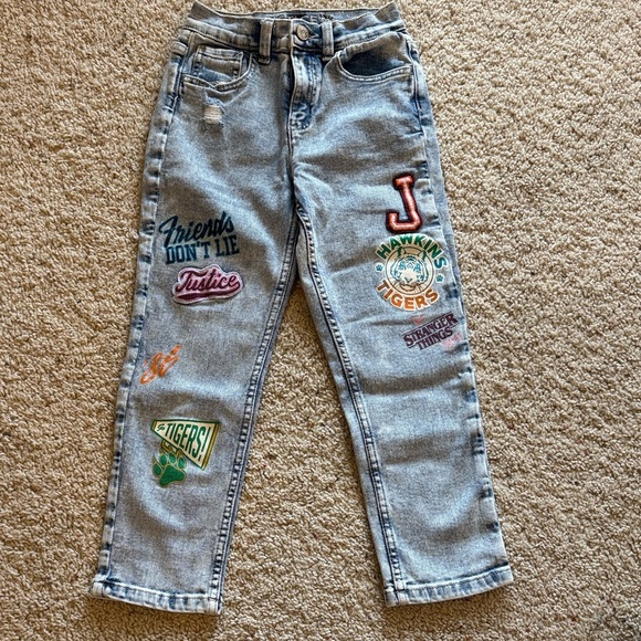 Stranger Things Denim - EUC Stranger Things x Justice Light Blue Jeans with Patches & graphics size 10